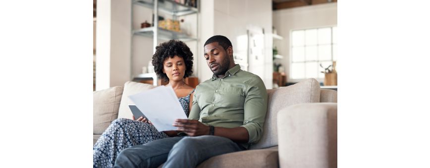 A couple looking over their biochemical test results